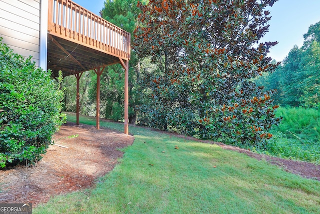 view of yard featuring a deck