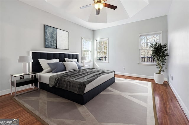 bedroom featuring ceiling fan and wood-type flooring