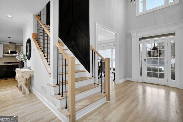 foyer entrance featuring light hardwood / wood-style flooring