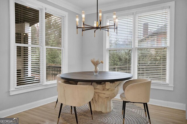 dining room with an inviting chandelier and a wealth of natural light