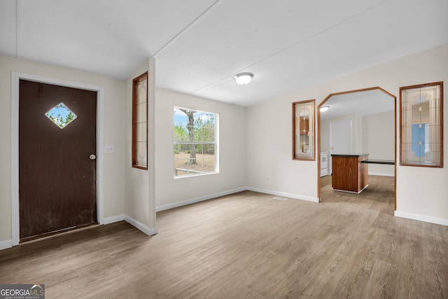 entrance foyer featuring light wood-type flooring