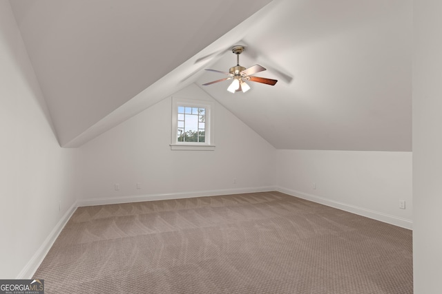 bonus room with carpet, ceiling fan, and lofted ceiling