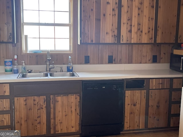 kitchen featuring sink and black appliances