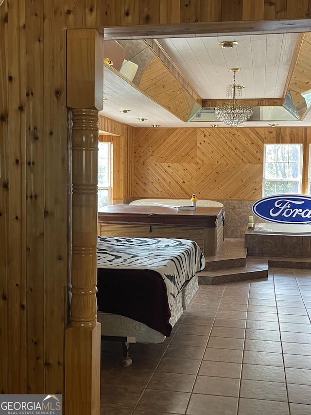 tiled bedroom with wooden walls and multiple windows