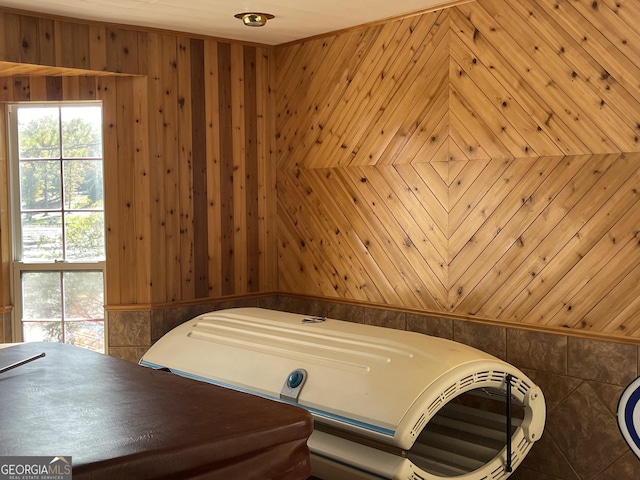 interior space featuring wood walls