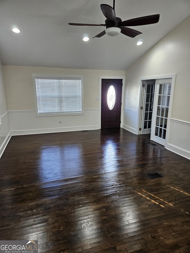 foyer featuring ceiling fan, dark hardwood / wood-style flooring, and lofted ceiling