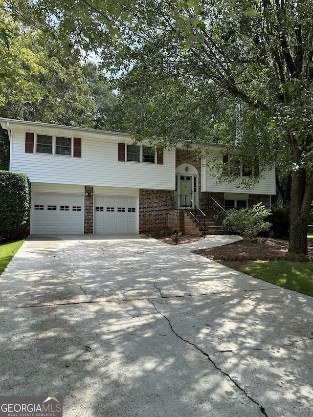 split foyer home featuring a garage