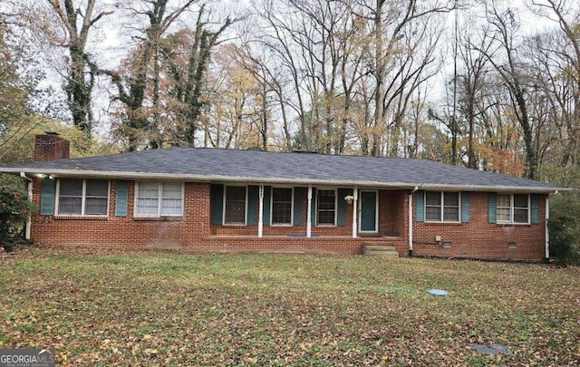 ranch-style house featuring a front lawn