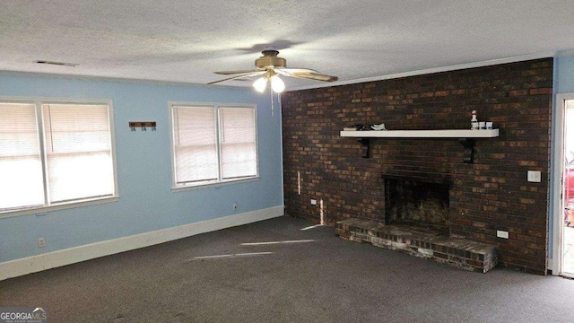 unfurnished living room featuring ceiling fan, a healthy amount of sunlight, a textured ceiling, and dark carpet