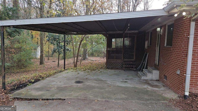 view of patio / terrace with a carport