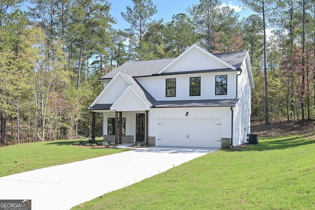 modern farmhouse style home with a garage, central AC unit, and a front yard