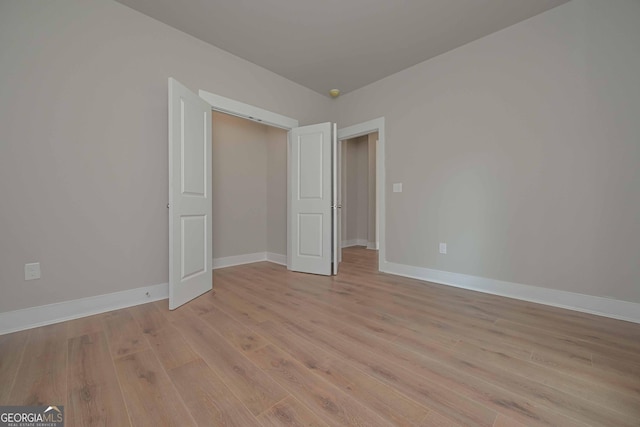 unfurnished bedroom featuring light hardwood / wood-style flooring