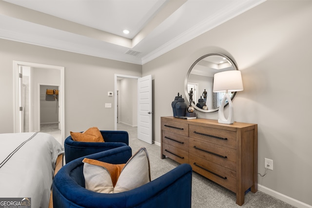 sitting room featuring light colored carpet, a raised ceiling, and crown molding