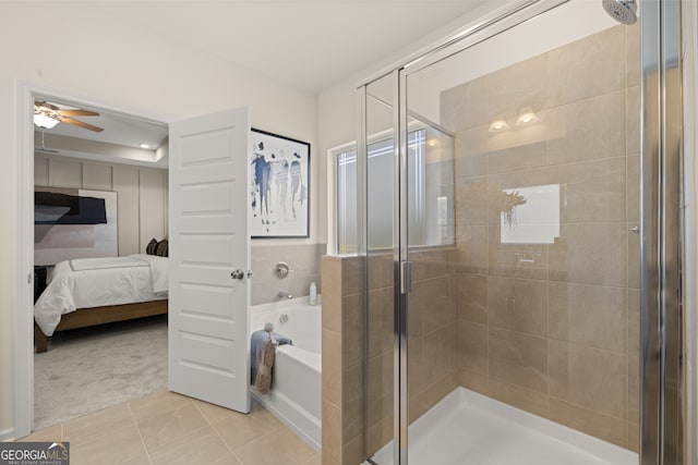 bathroom featuring tile patterned floors, ceiling fan, and independent shower and bath