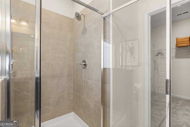 bathroom featuring walk in shower