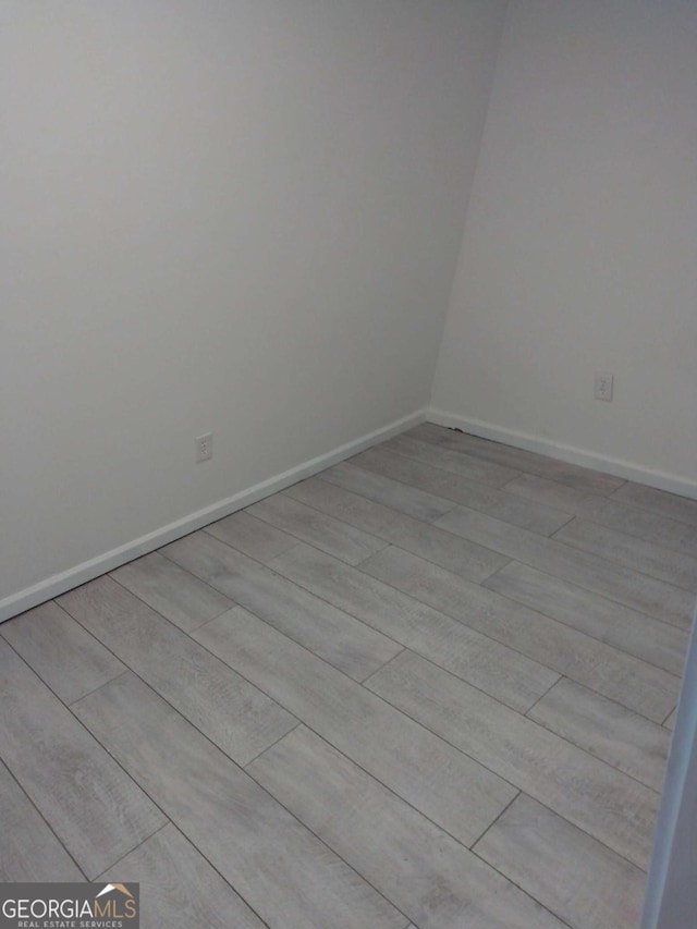 empty room featuring light wood-type flooring