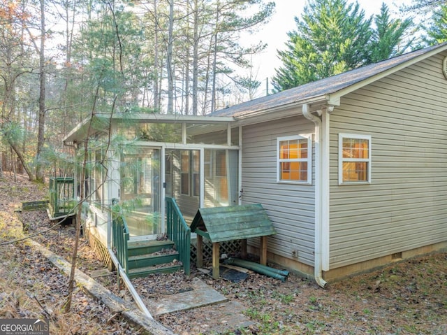 exterior space with a sunroom