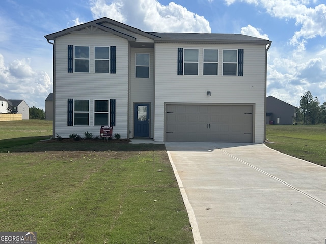 view of front of house featuring a front yard and a garage