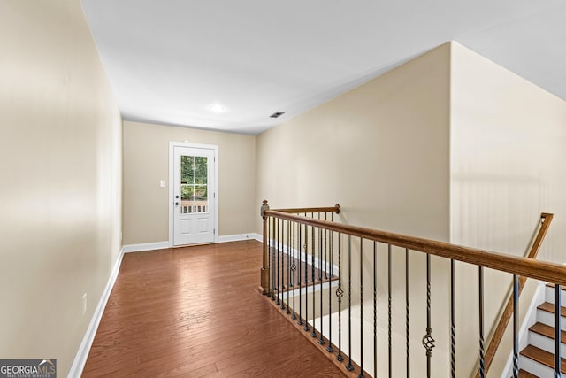 hall featuring dark hardwood / wood-style floors