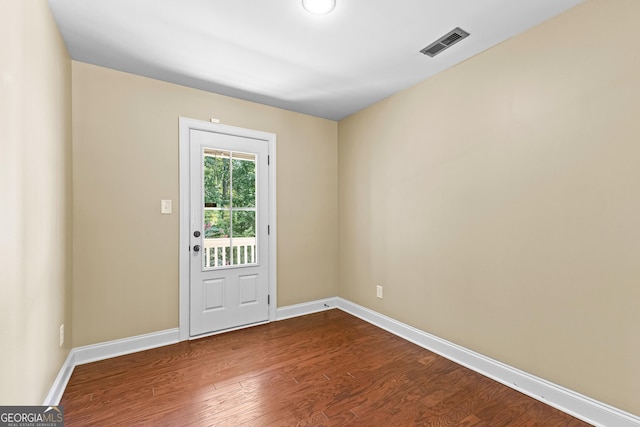 doorway featuring hardwood / wood-style flooring