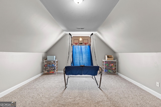 game room featuring lofted ceiling and carpet floors