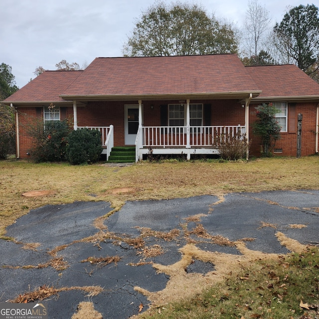240 Chambers Rd, Mcdonough, GA 30253 - ranch-style home with a porch and brick siding