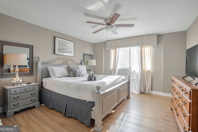 bedroom featuring light wood-type flooring and ceiling fan