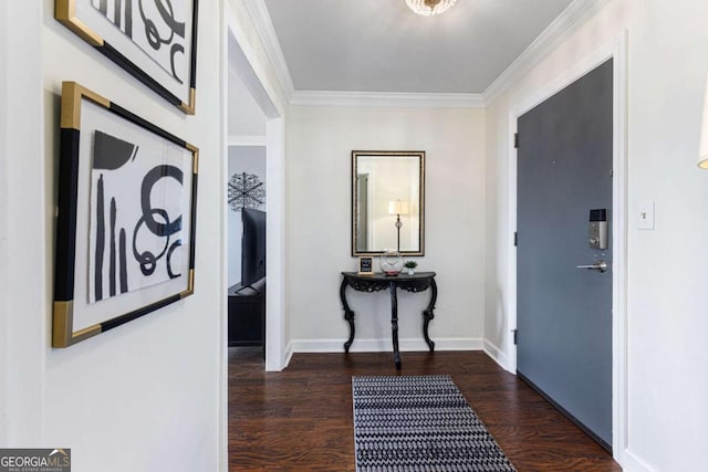 entryway with dark hardwood / wood-style floors and crown molding