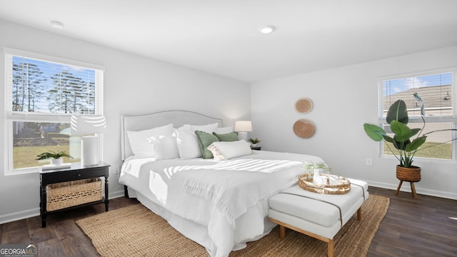 bedroom featuring dark hardwood / wood-style floors