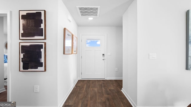 corridor featuring dark wood-type flooring