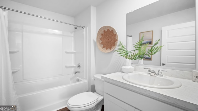 full bathroom featuring shower / tub combo with curtain, vanity, and toilet