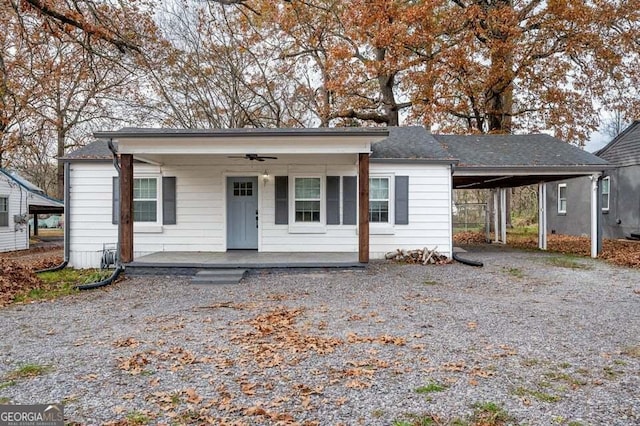 view of front of home with a porch and ceiling fan