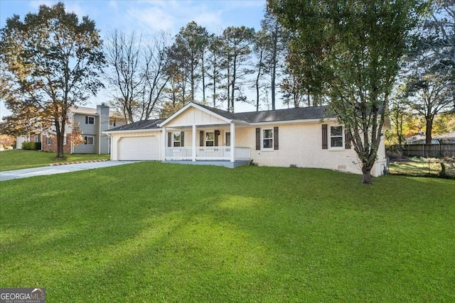 single story home featuring a front lawn, covered porch, and a garage