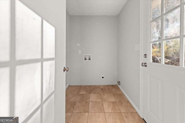 laundry area featuring hookup for an electric dryer and hookup for a washing machine