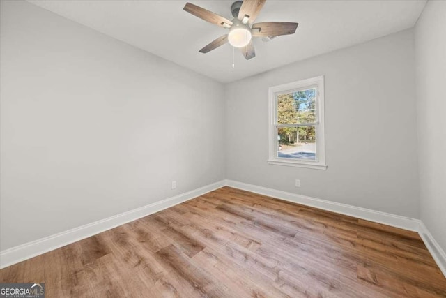 unfurnished room with light hardwood / wood-style flooring and ceiling fan