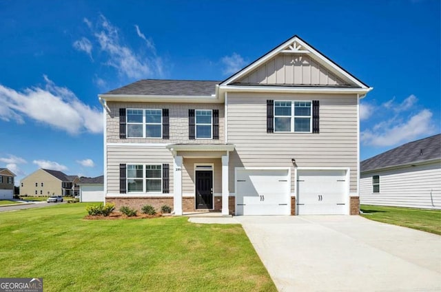 craftsman-style home with a garage and a front yard