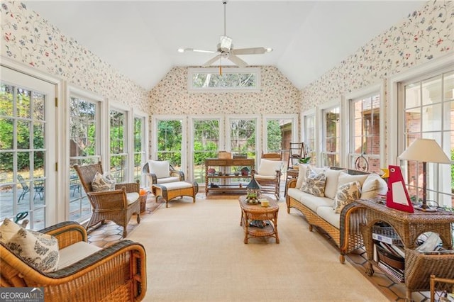 sunroom featuring vaulted ceiling, a wealth of natural light, and ceiling fan