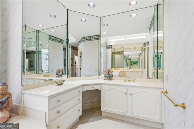 bathroom featuring tile patterned floors and vanity