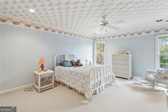 bedroom with carpet flooring and ceiling fan