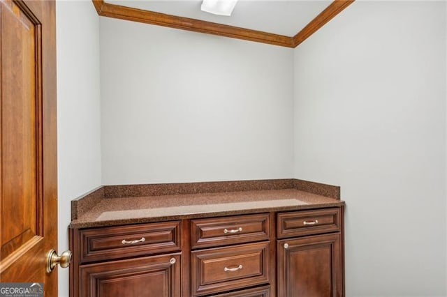 bathroom with crown molding