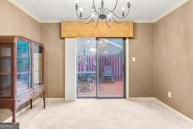 carpeted dining space with a chandelier, a textured ceiling, and crown molding