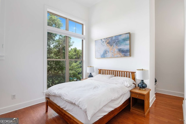 bedroom featuring hardwood / wood-style flooring