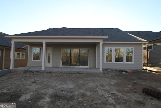 back of house featuring a patio