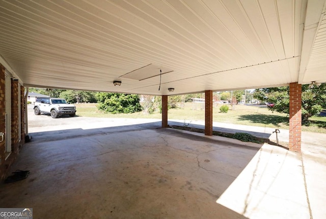 view of patio / terrace with a carport