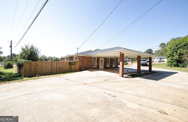 view of patio featuring a carport