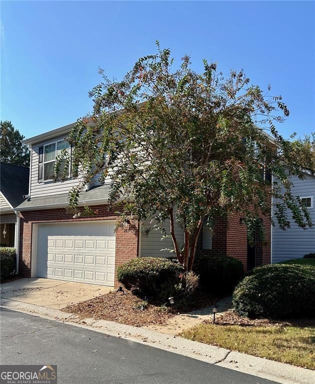 view of front of property with a garage