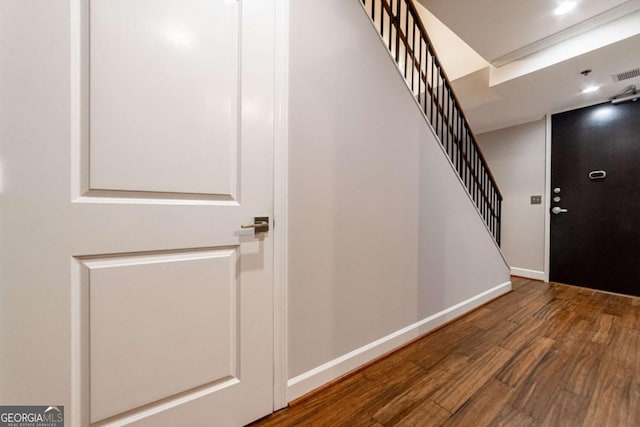 entryway with hardwood / wood-style flooring