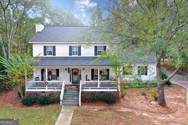 view of front of property featuring covered porch