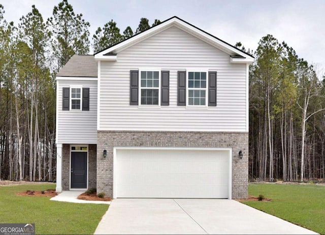 view of front of house featuring a garage and a front lawn