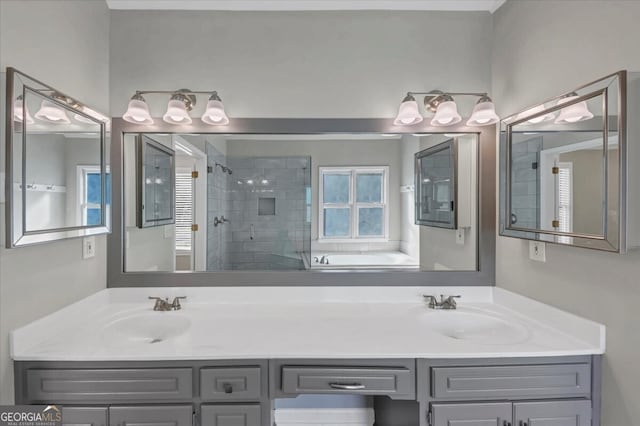 bathroom featuring vanity and tiled shower